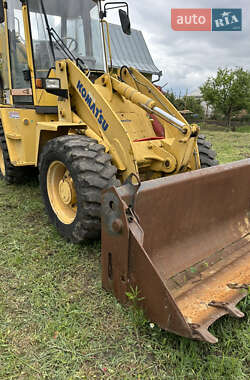 Экскаватор погрузчик Komatsu WB 2005 в 