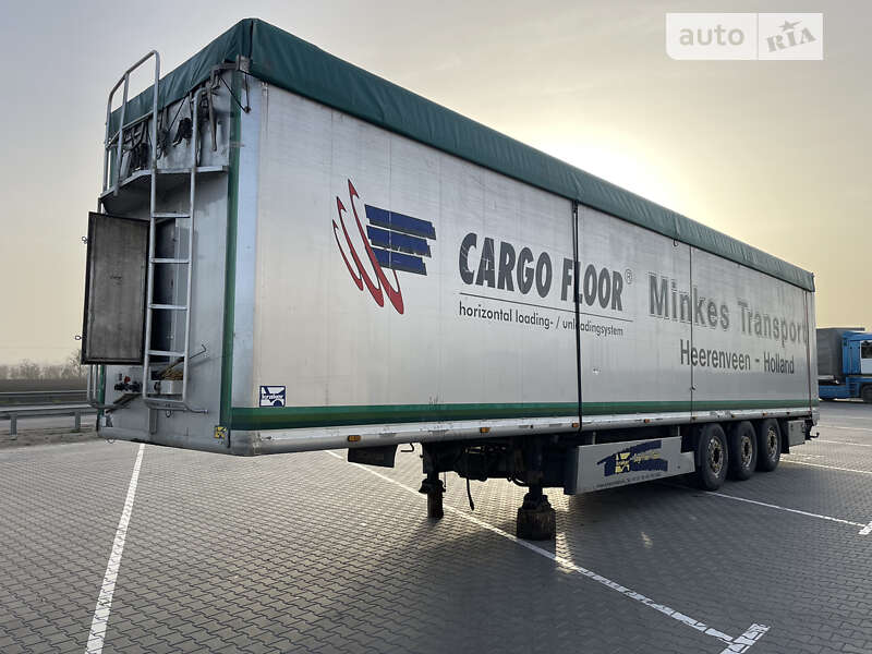 Самосвал полуприцеп Kraker BU10-18STK 2004 в Виннице