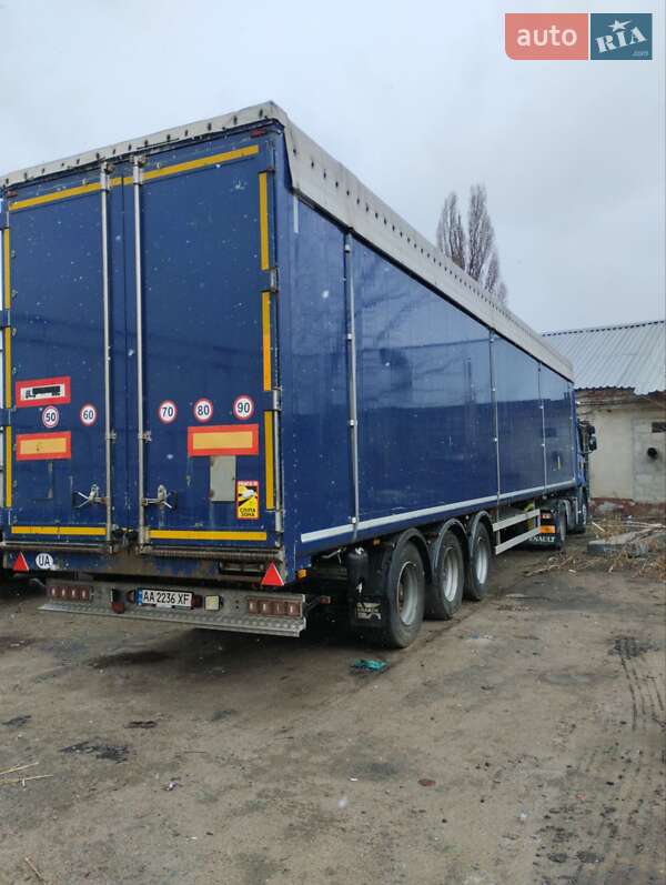 Самосвал полуприцеп Kraker CF 300 2012 в 