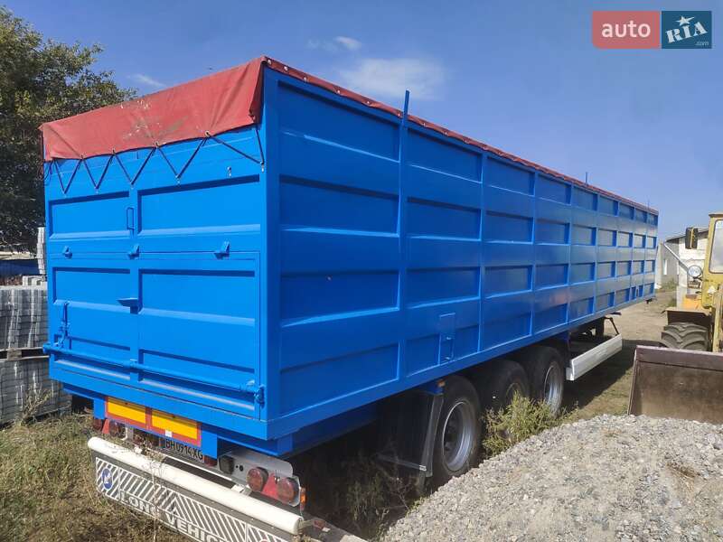 Бортовой полуприцеп Krone SD 27 2009 в Сарате
