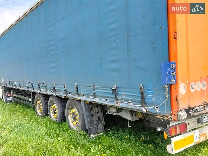 Тентованный борт (штора) - полуприцеп Krone SD 2009 в Полтаве