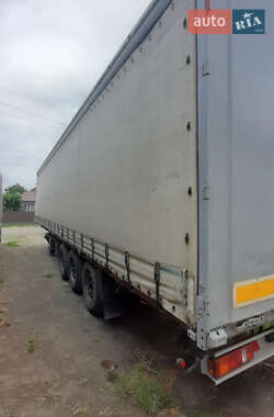 Тентованный борт (штора) - полуприцеп Krone SDP 27 2002 в 