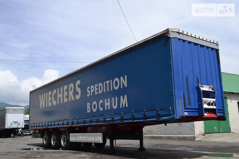 Тентований борт (штора) - напівпричіп Krone SDP 2010 в Хусті