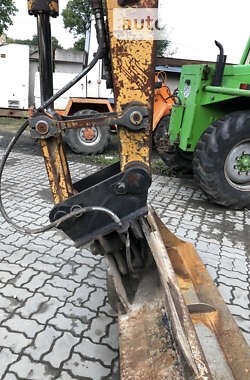 Колесный экскаватор Liebherr 311 1996 в Калуше