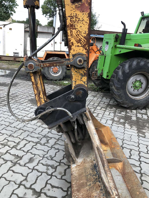 Колесный экскаватор Liebherr 311 1996 в Калуше