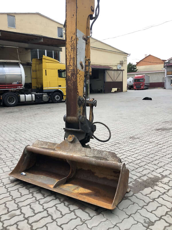Колесный экскаватор Liebherr 311 1996 в Калуше