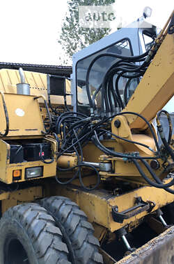 Колесный экскаватор Liebherr 311 1996 в Калуше