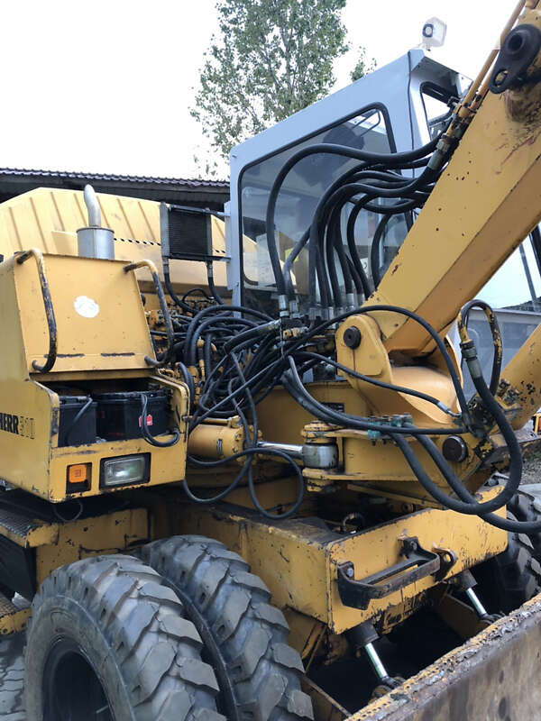 Колесный экскаватор Liebherr 311 1996 в Калуше