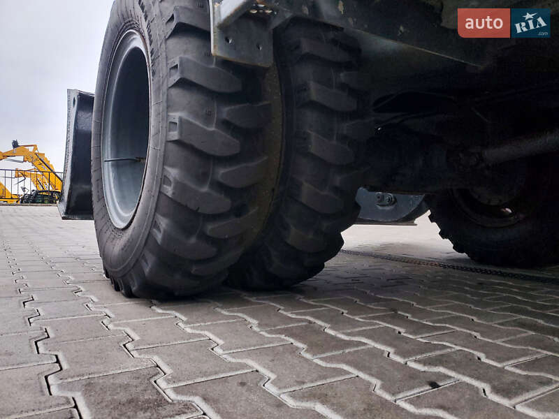 Колесный экскаватор Liebherr 312 2010 в Ровно