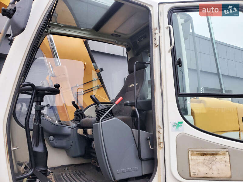 Колесный экскаватор Liebherr 312 2010 в Ровно