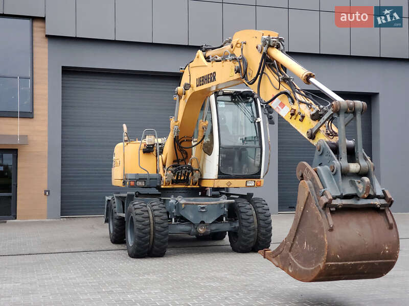 Колесный экскаватор Liebherr 312 2010 в Ровно