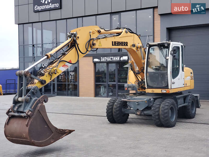 Колесный экскаватор Liebherr 312 2010 в Ровно
