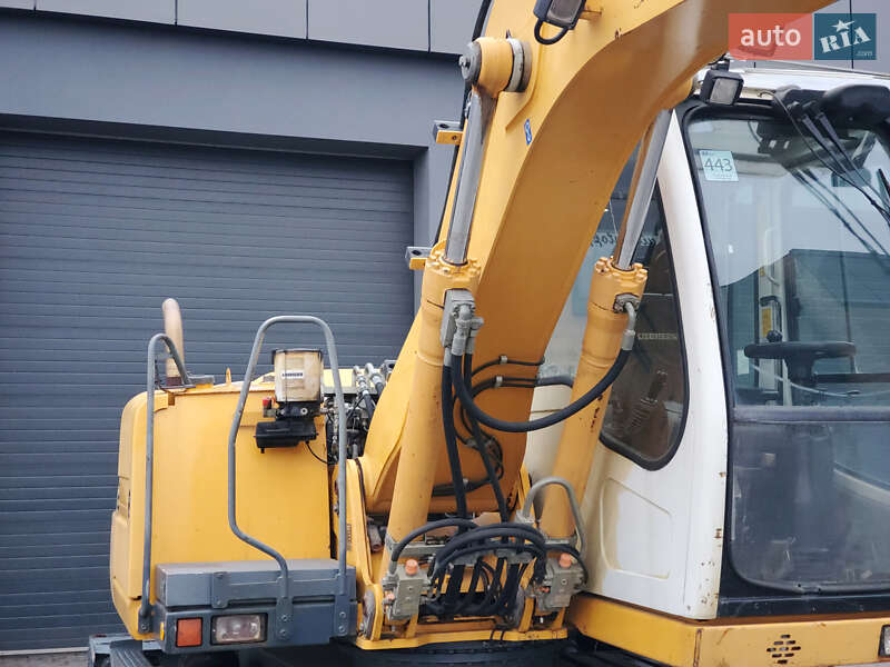 Колесный экскаватор Liebherr 312 2010 в Ровно