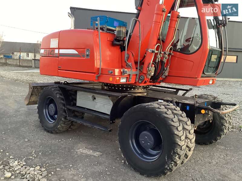Колесный экскаватор Liebherr 314 2008 в Виноградове