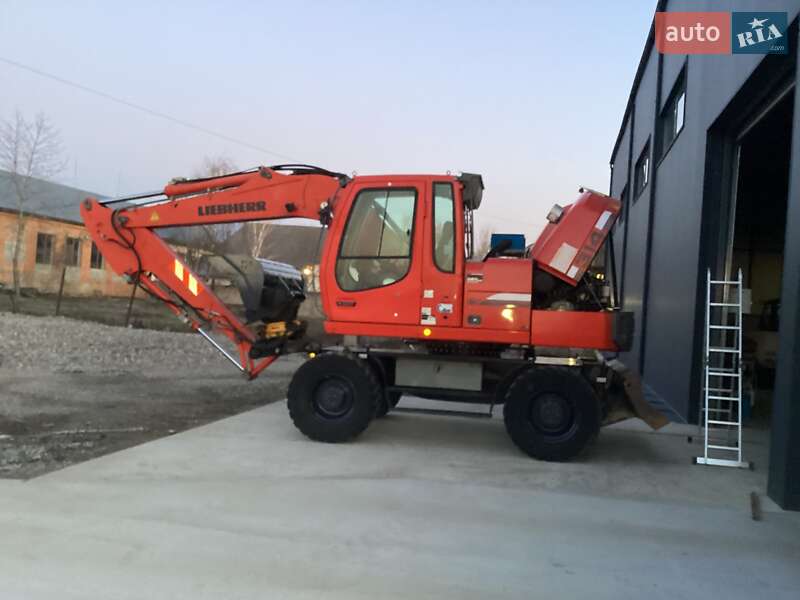Колесный экскаватор Liebherr 314 2008 в Виноградове