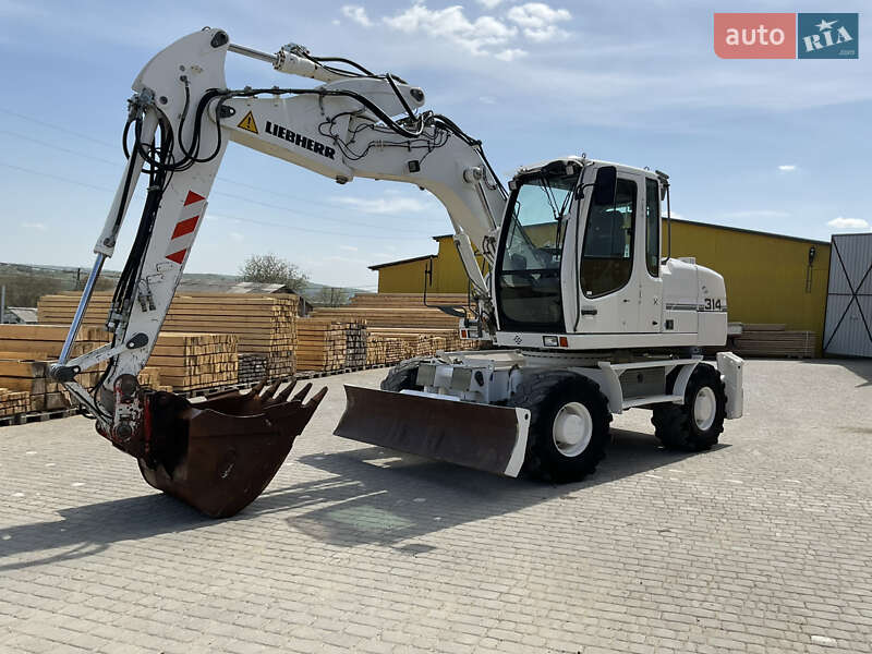Колесный экскаватор Liebherr 314 2011 в 