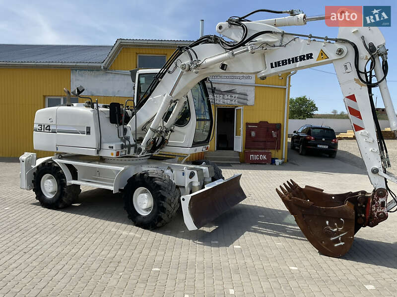 Колесный экскаватор Liebherr 314 2011 в 