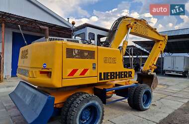 Колесный экскаватор Liebherr 902 1900 в 