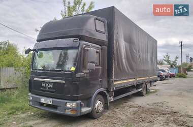 Тентований MAN 12 2011 в 