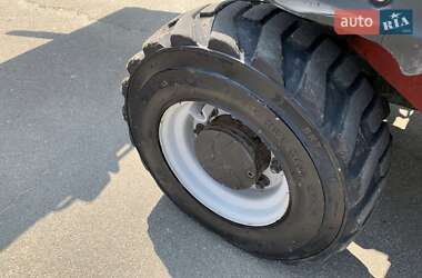 Телескопический погрузчик Manitou MT 2018 в 