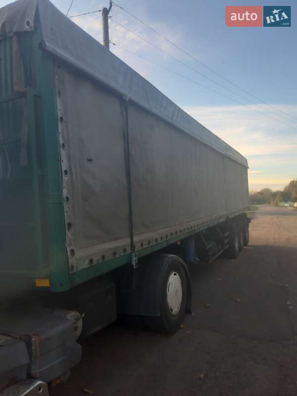 Зерновоз - полуприцеп МАЗ 9758 2005 в Лубнах