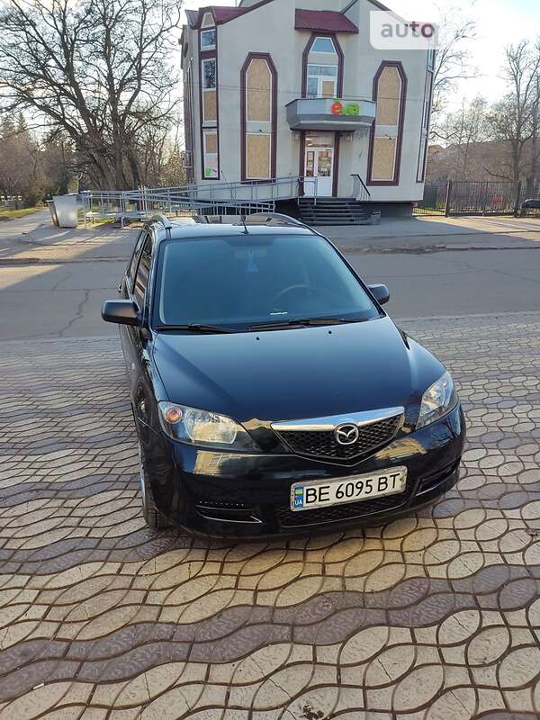 Хэтчбек Mazda 2 2003 в 
