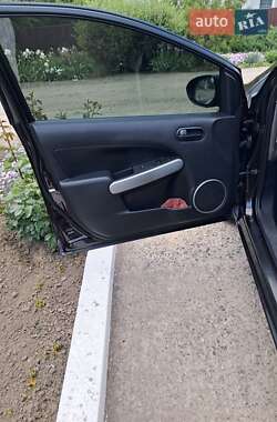 Хэтчбек Mazda 2 2009 в 