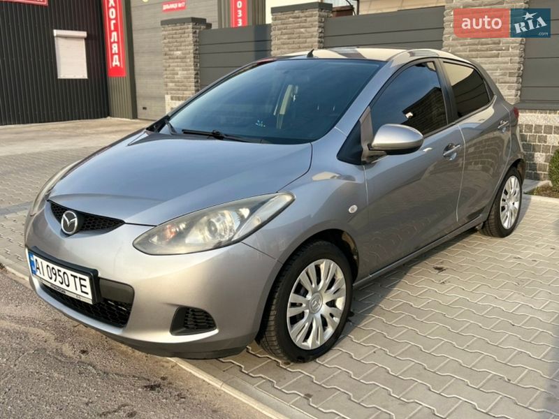 2009 Mazda 2, VIN JMZDE14J200266403:plate — фото 1 (autoria)