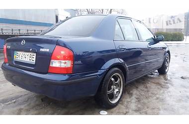 Седан Mazda 323 1999 в Ровно