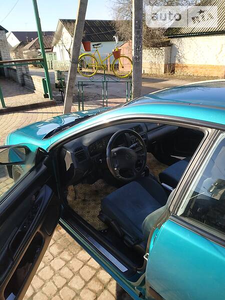 Хэтчбек Mazda 323 1998 в Глухове фото 4 Хэтчбек Mazda 323 1998 в Глухове