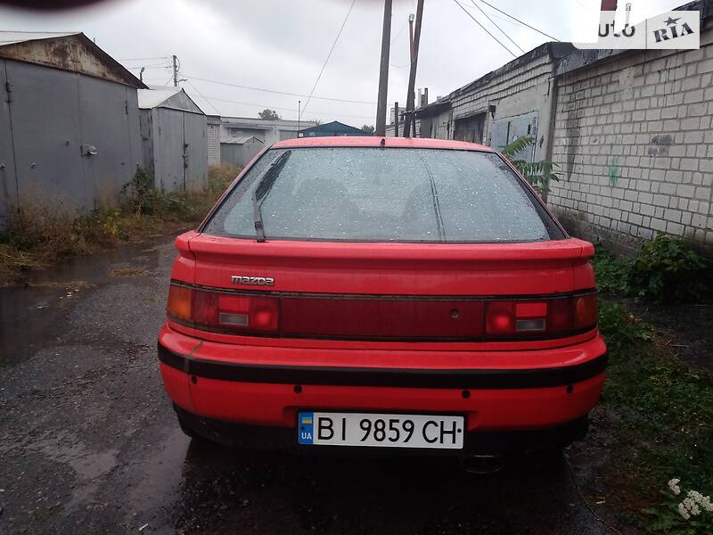 Хэтчбек Mazda 323 1994 в Кременчуге фото 13 Хэтчбек Mazda 323 1994 в Кременчуге