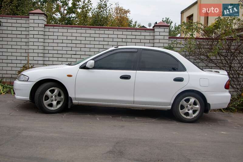 Седан Mazda 323 1998 в Днепре