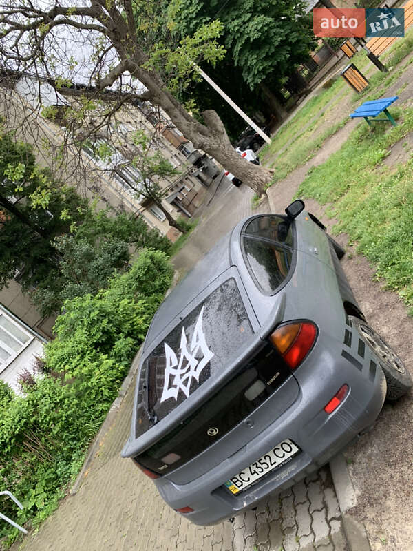 Седан Mazda 323 1996 в Надворной фото 3 Седан Mazda 323 1996 в Надворной