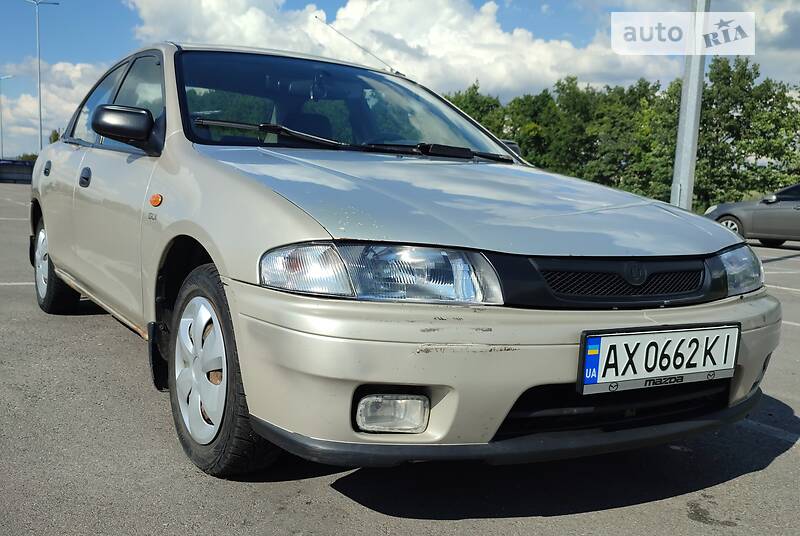 AUTO.RIA – Продам Мазда 323 1997 (AX0662KI) бензин 1.5 седан бу у