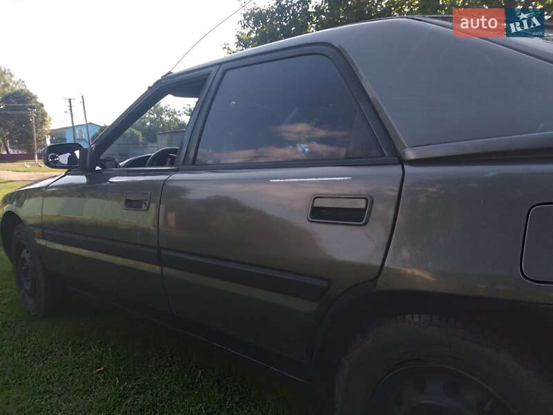 Хетчбек Mazda 323 1992 в Старій Синяві фото 5 Хетчбек Mazda 323 1992 в Старій Синяві