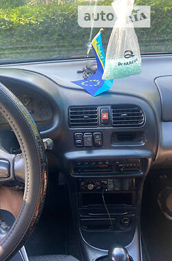 Купе Mazda 323 1996 в 