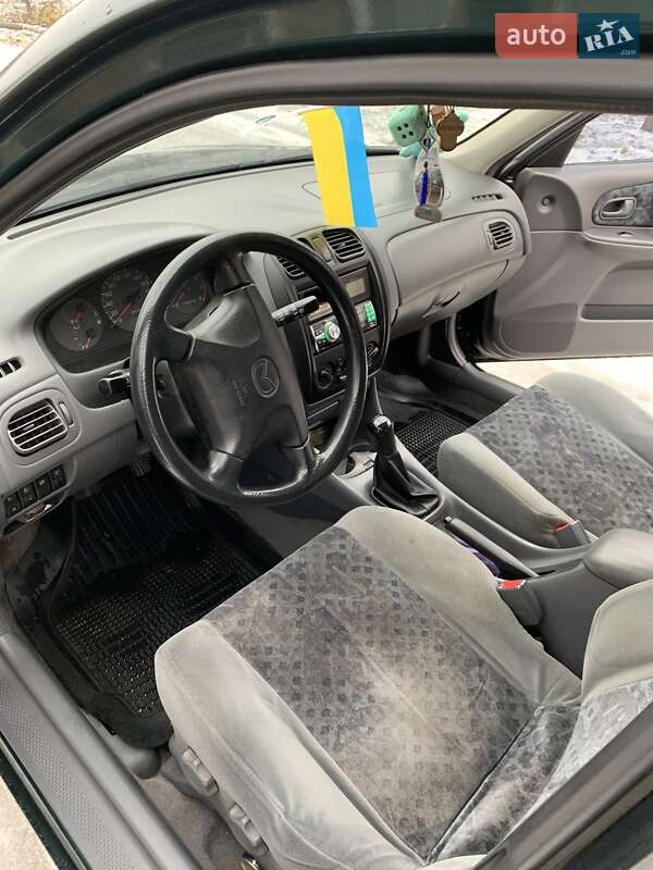 Хэтчбек Mazda 323 1998 в Кропивницком фото 8 Хэтчбек Mazda 323 1998 в Кропивницком