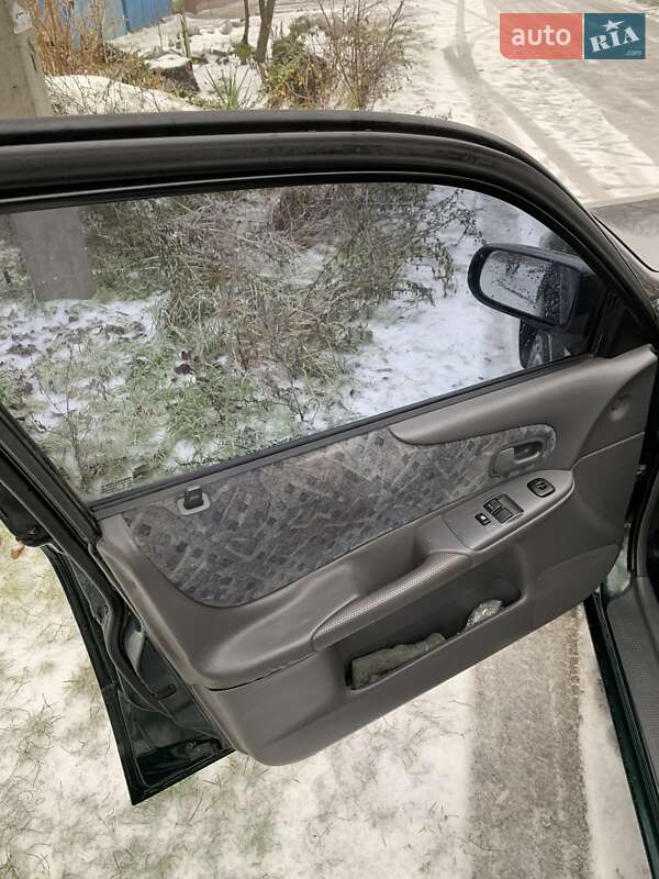 Хэтчбек Mazda 323 1998 в Кропивницком фото 9 Хэтчбек Mazda 323 1998 в Кропивницком