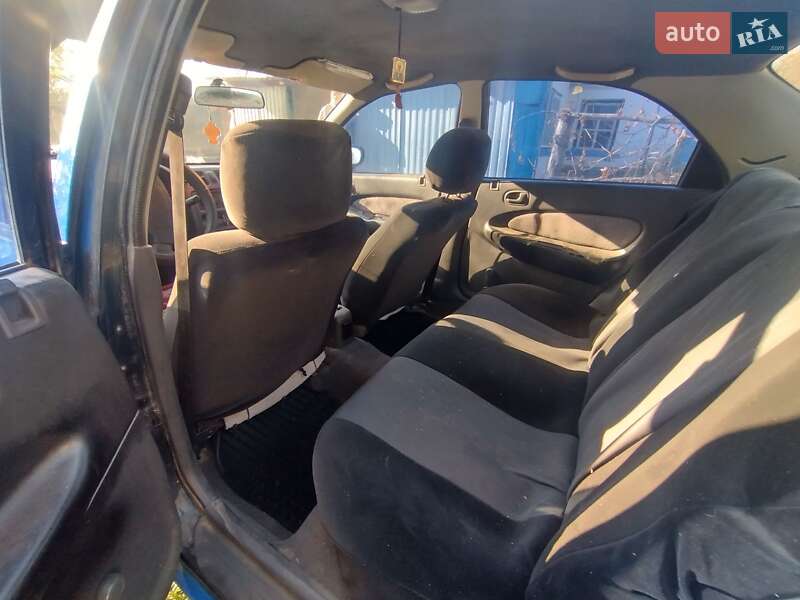 Седан Mazda 323 1997 в Христинівці фото 5 Седан Mazda 323 1997 в Христинівці
