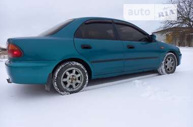 Седан Mazda 323 1996 в 