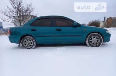 Седан Mazda 323 1996 в 