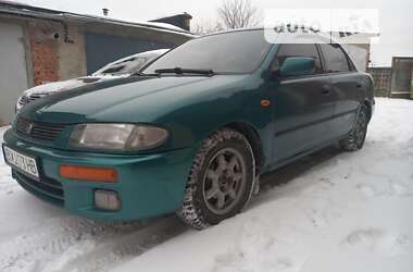 Седан Mazda 323 1996 в 