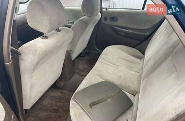 Седан Mazda 323 1999 в 