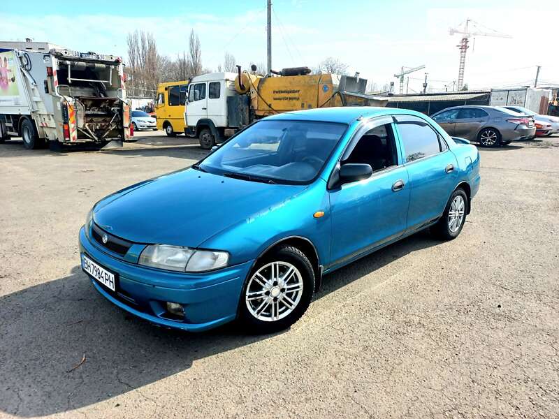 Седан Mazda 323 1998 в Одесі фото 3 Седан Mazda 323 1998 в Одесі