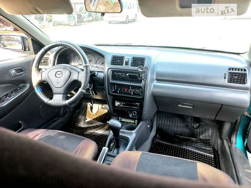Седан Mazda 323 1998 в Одесі фото 15 Седан Mazda 323 1998 в Одесі
