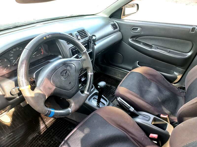 Седан Mazda 323 1998 в Одесі фото 16 Седан Mazda 323 1998 в Одесі