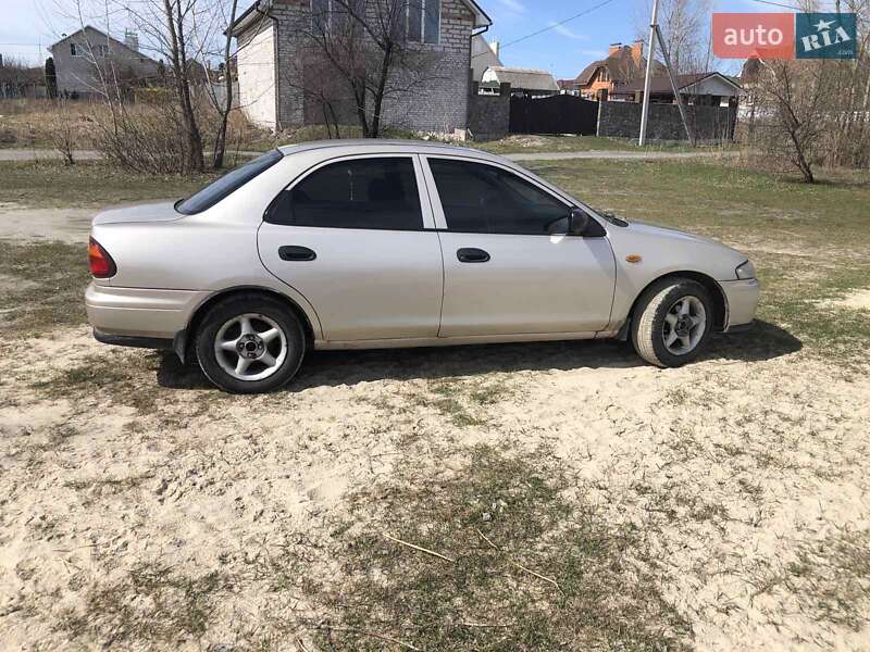 Седан Mazda 323 1998 в Кременчуге фото 2 Седан Mazda 323 1998 в Кременчуге