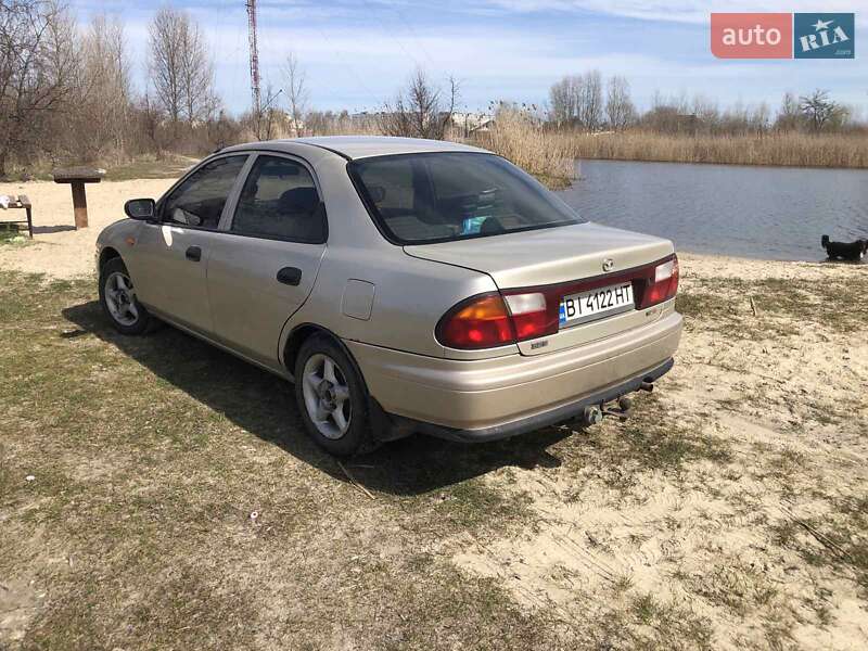 Седан Mazda 323 1998 в Кременчуге фото 5 Седан Mazda 323 1998 в Кременчуге
