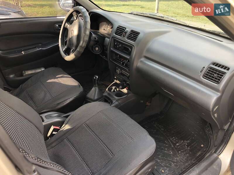 Седан Mazda 323 1998 в Кременчуге фото 8 Седан Mazda 323 1998 в Кременчуге