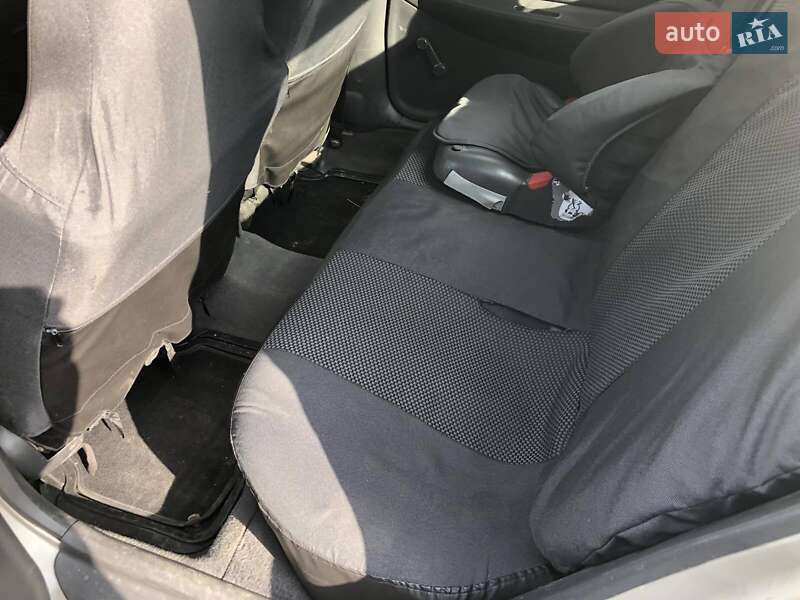 Седан Mazda 323 1998 в Кременчуге фото 10 Седан Mazda 323 1998 в Кременчуге